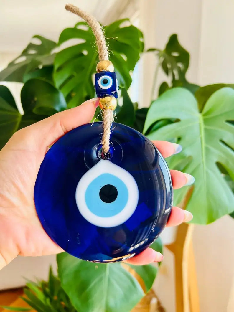 Glass blue evil eye wall hanging, product photo