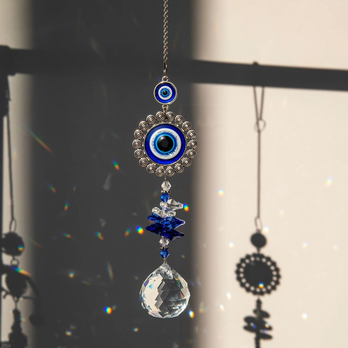 Evil eye crystal prism suncatcher, product photo