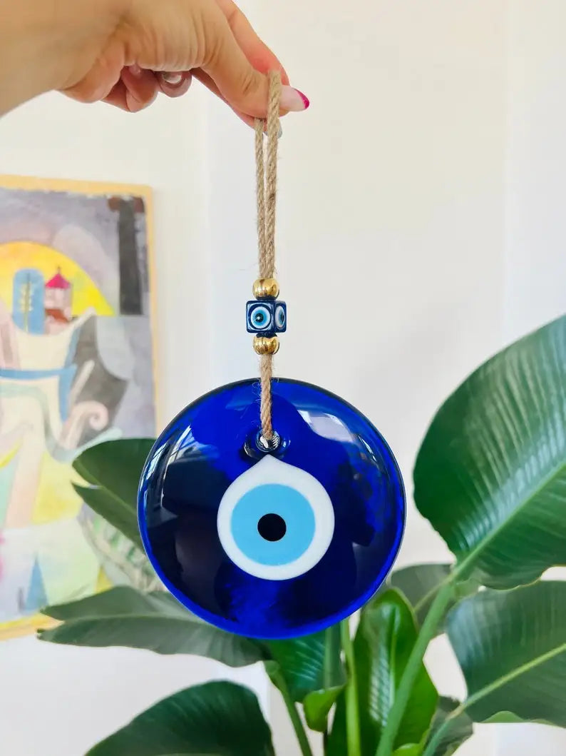 Glass blue evil eye wall hanging, product photo