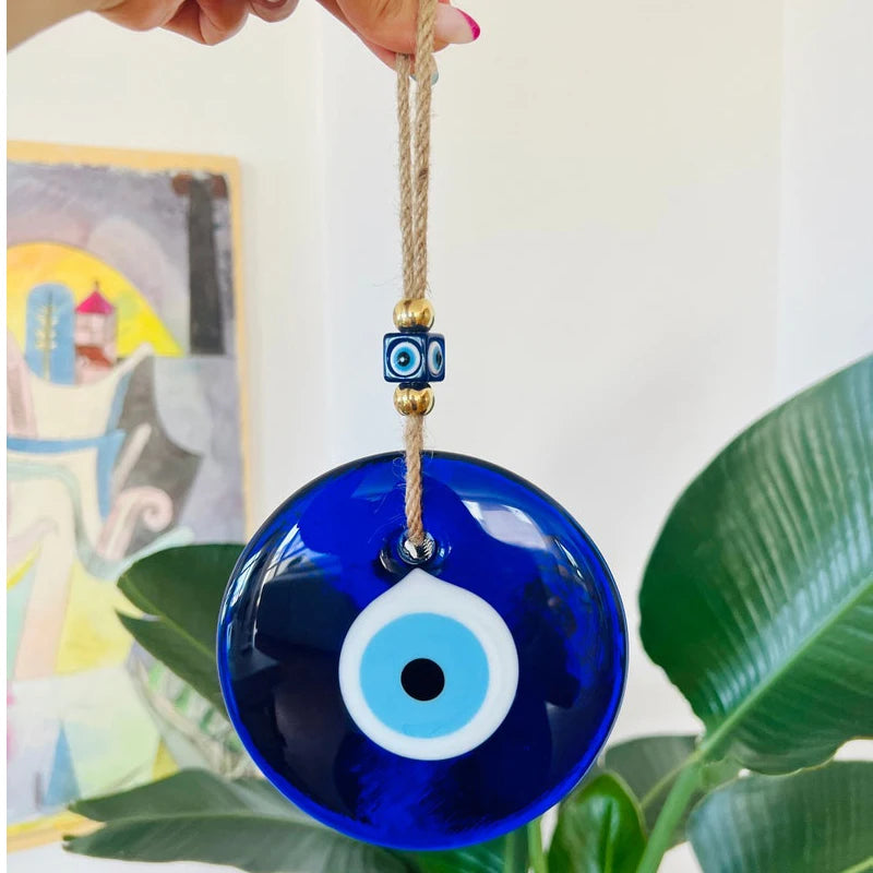 Glass blue evil eye wall hanging, product photo