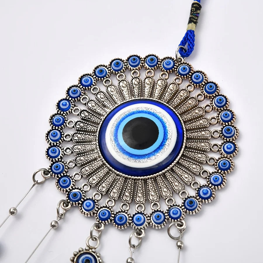 Blue evil eye bell tassel wind chime, product photo