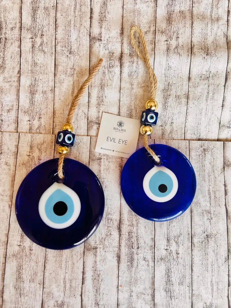 Glass blue evil eye wall hanging, product photo