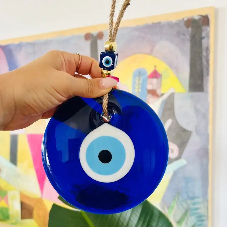Glass blue evil eye wall hanging, product photo