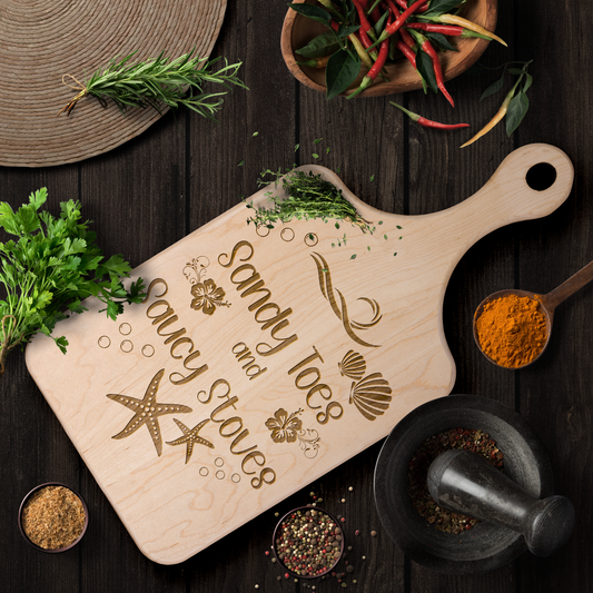 Sandy_Toes_and_Saucy_Stoves_Cutting_Boar_Light_Handle_V_Lifestyle_Mockup.png