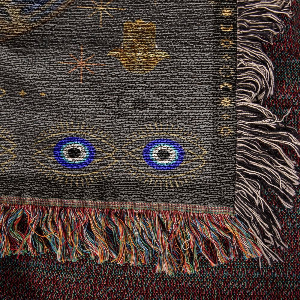 Experience the melding of comfort and mystique with our Evil Eye Woven Blanket. It's not just a blanket; it's a statement piece that invites positivity and style into your living space. Wrap yourself in the soothing energy of ancient symbolism!